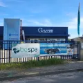 Vue extérieure du magasin Be Spa Calypso Piscines à Romans-sur-Isère, situé au 22 Avenue des Allobroges. La façade du magasin est visible avec le logo de Be Spa clairement affiché, invitant les clients à découvrir les produits pour piscines et spas.
